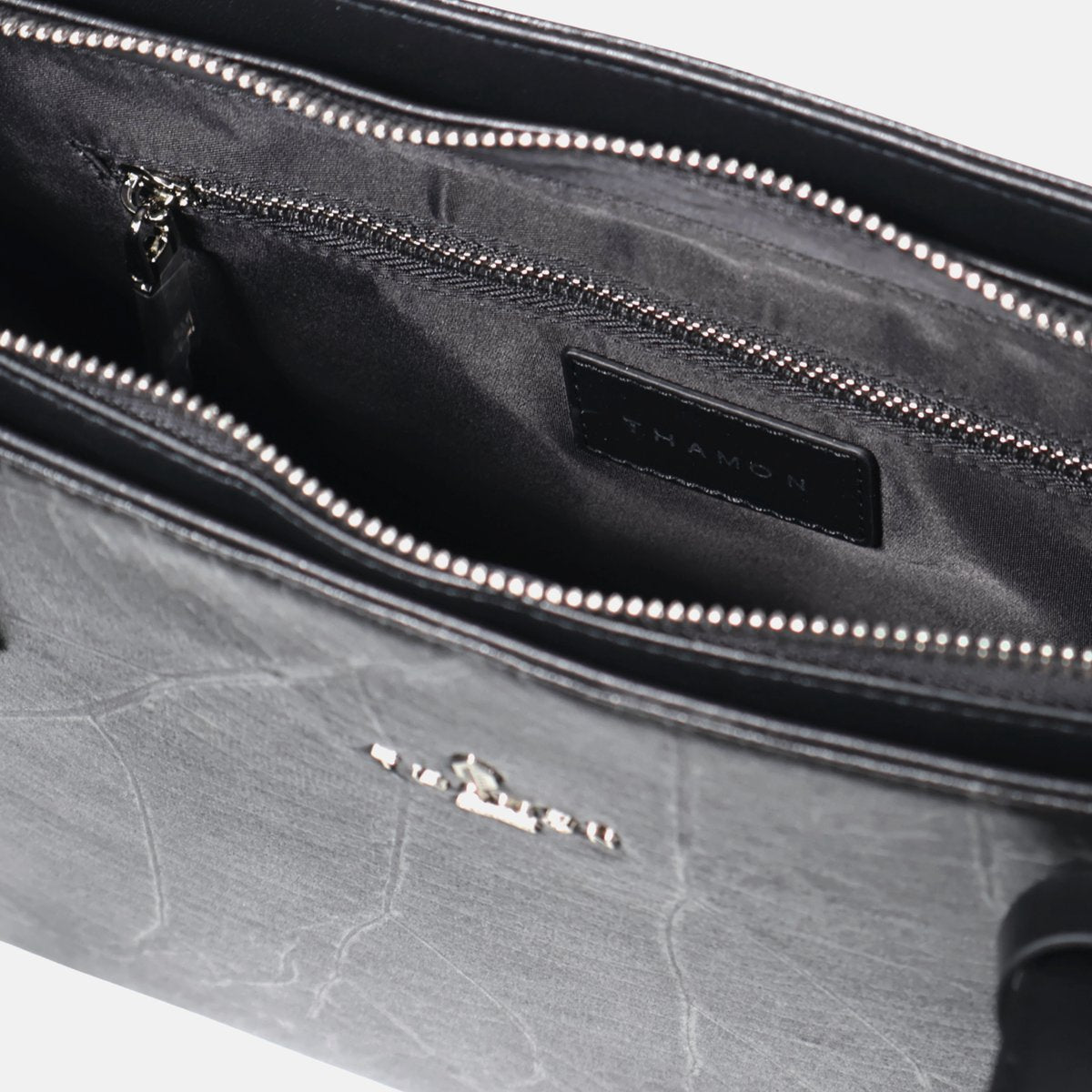 Inside detail view of Thamon London Black tote bag in vegan leaf leather for women.
