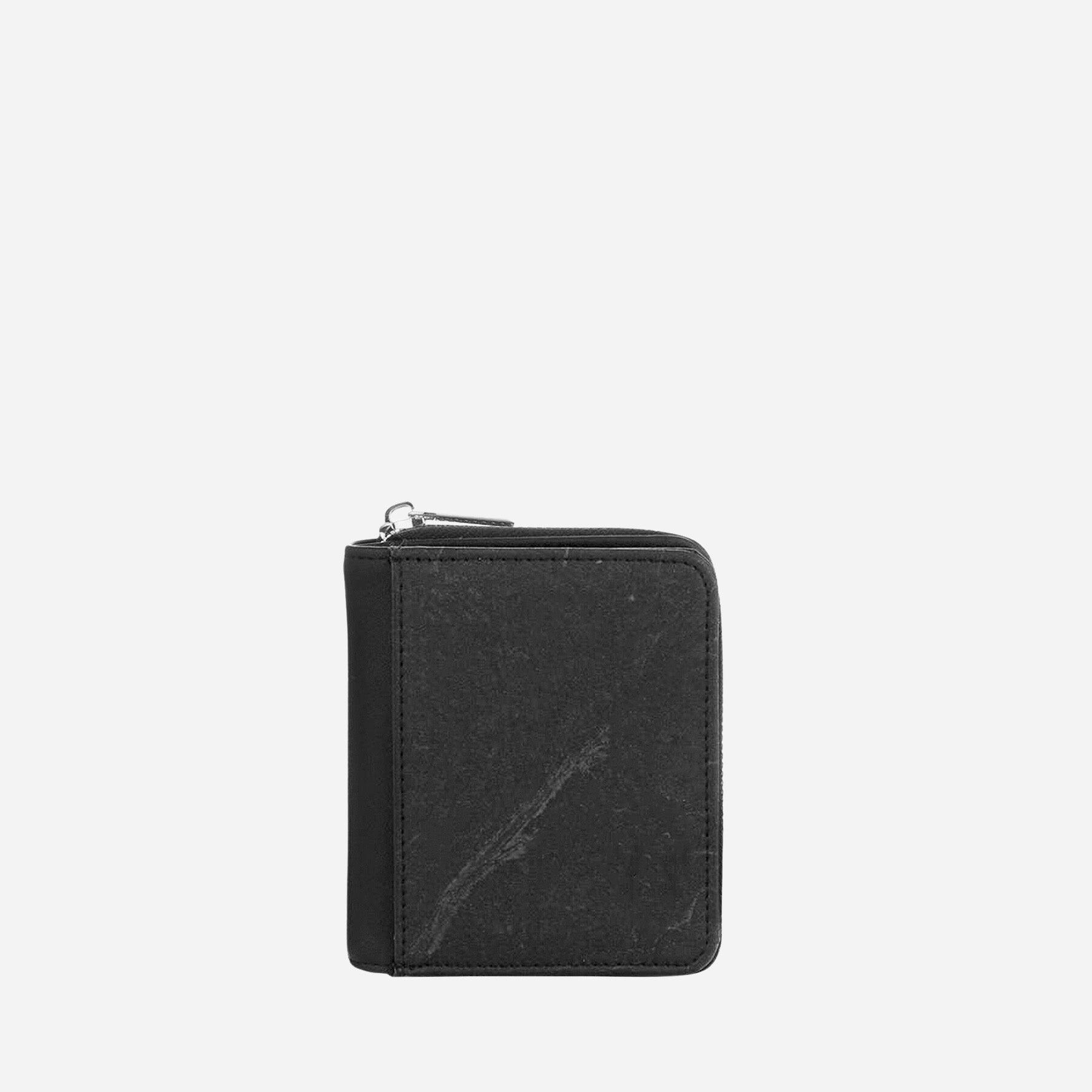 Back view of a Thamon black leaf leather compact zip-around wallet with a visible leaf vein texture.