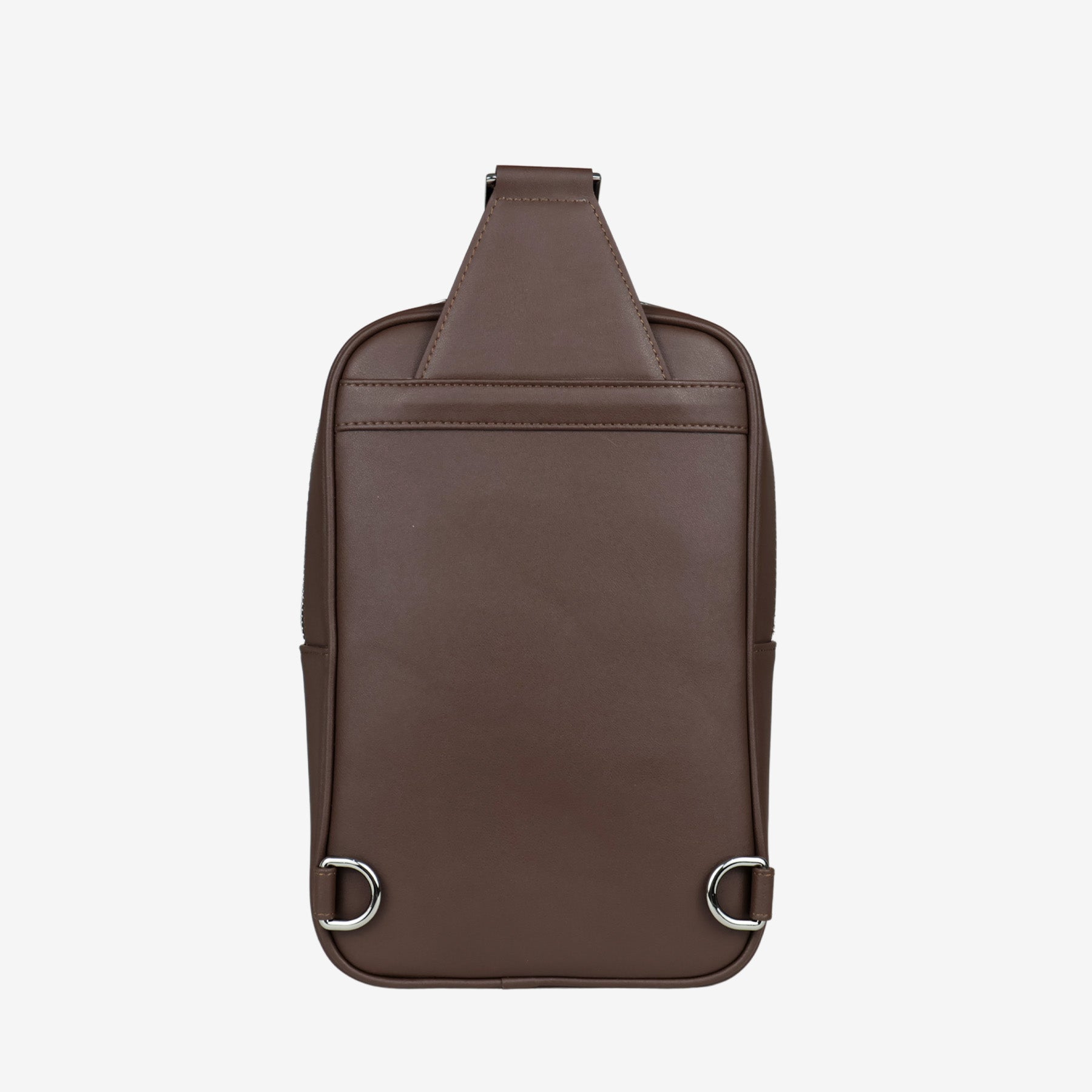Back view of Nomad sling bag in walnut brown vegan leather with dual D-rings and minimal design