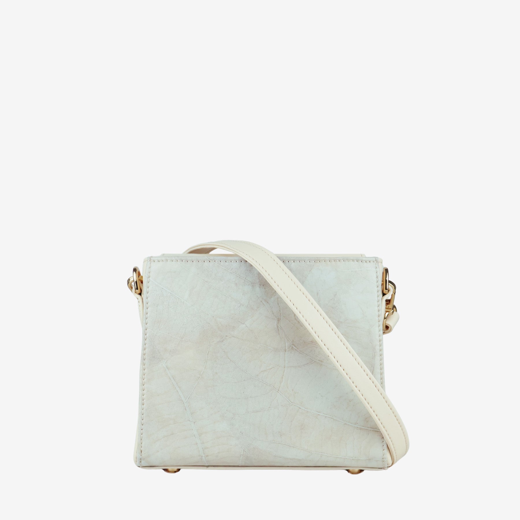 Elegant Thamon Pearl Ivory White handbag showcasing its distinctive leaf leather material and a functional shoulder strap.