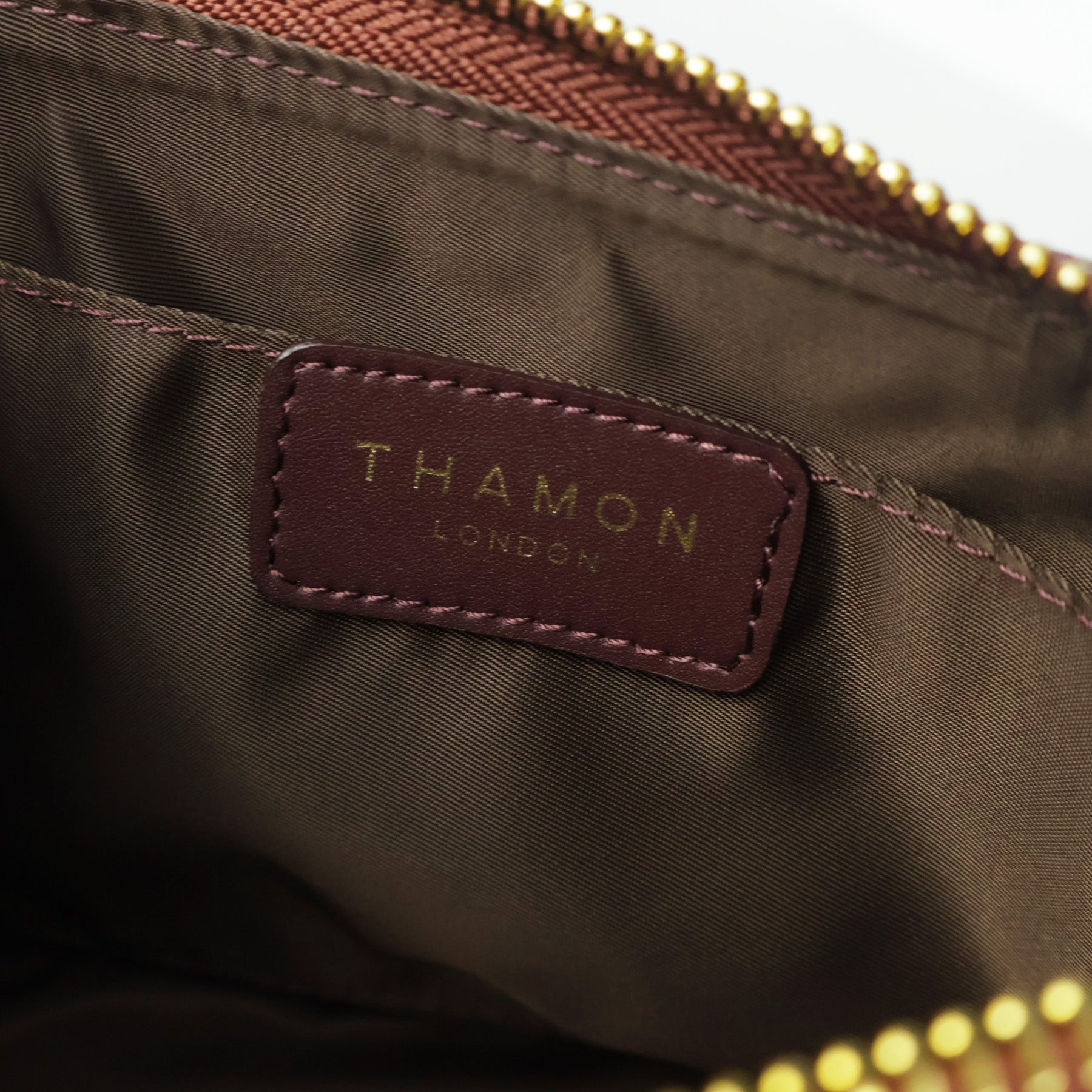 Interior view of Spice Brown Maki bag with THAMON London brand label.