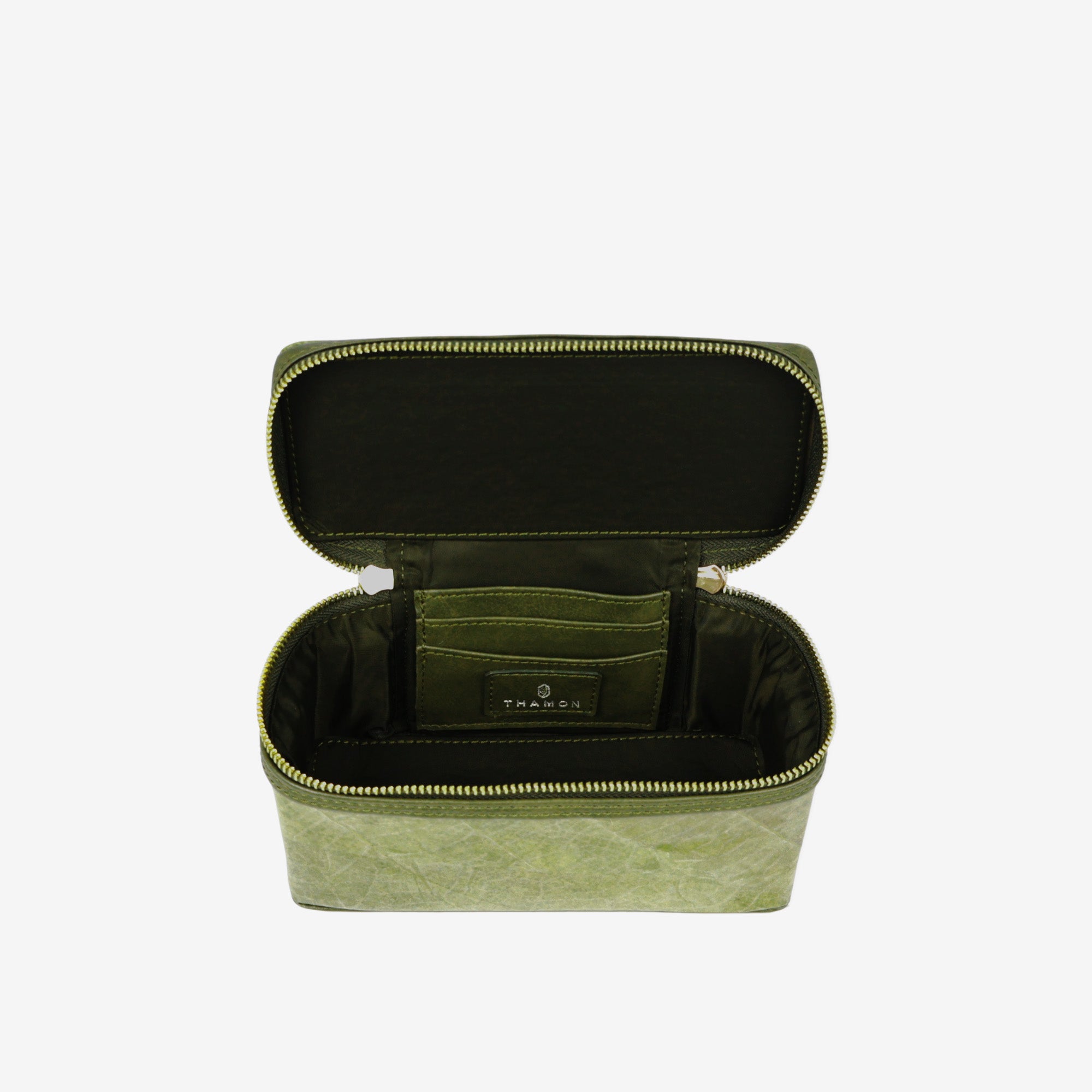Top view of Thamon Vanity Crossbody Bag in olive green Leaftex with gold hardware.