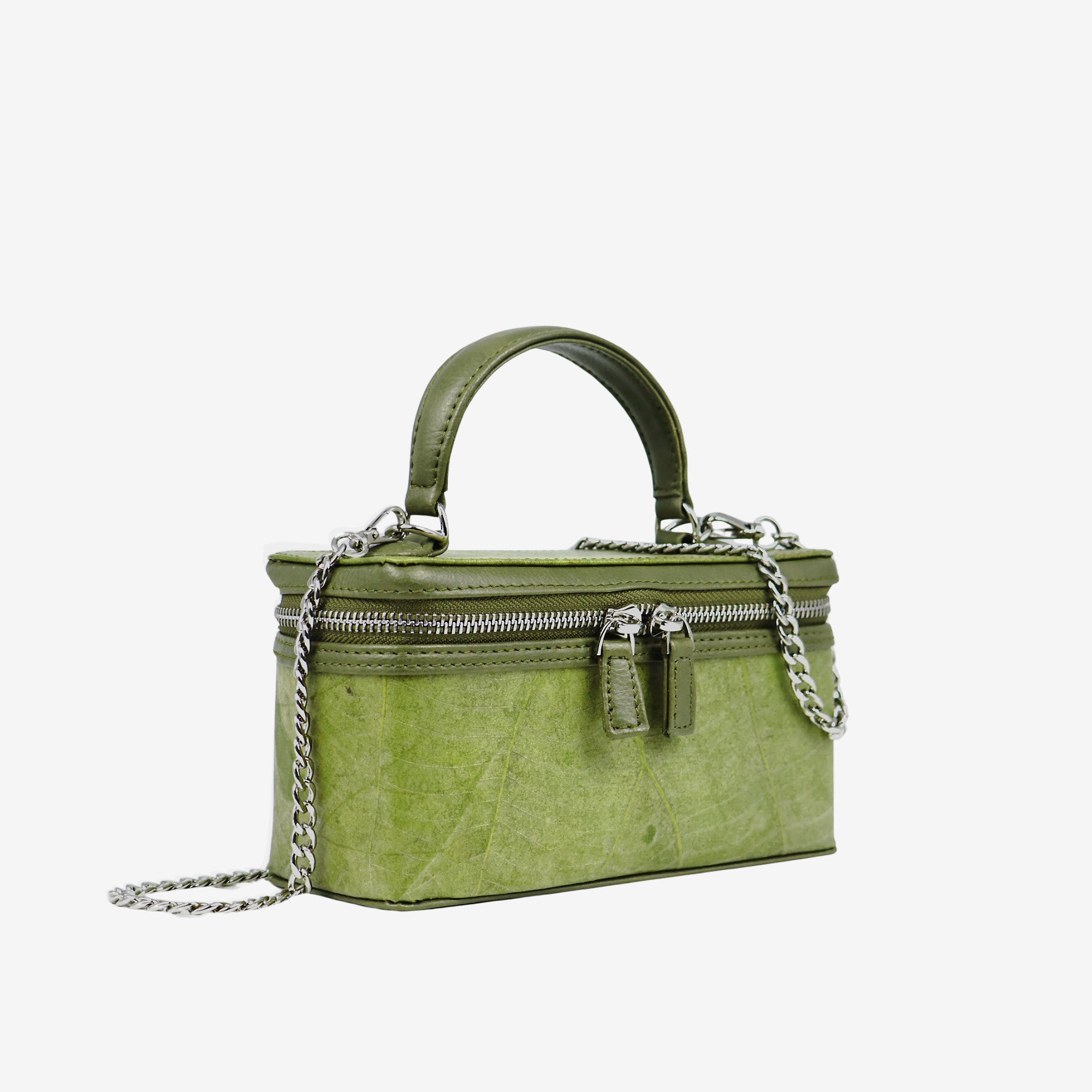 Side view of Thamon Vanity Crossbody Bag in olive green Leaftex with silver hardware.