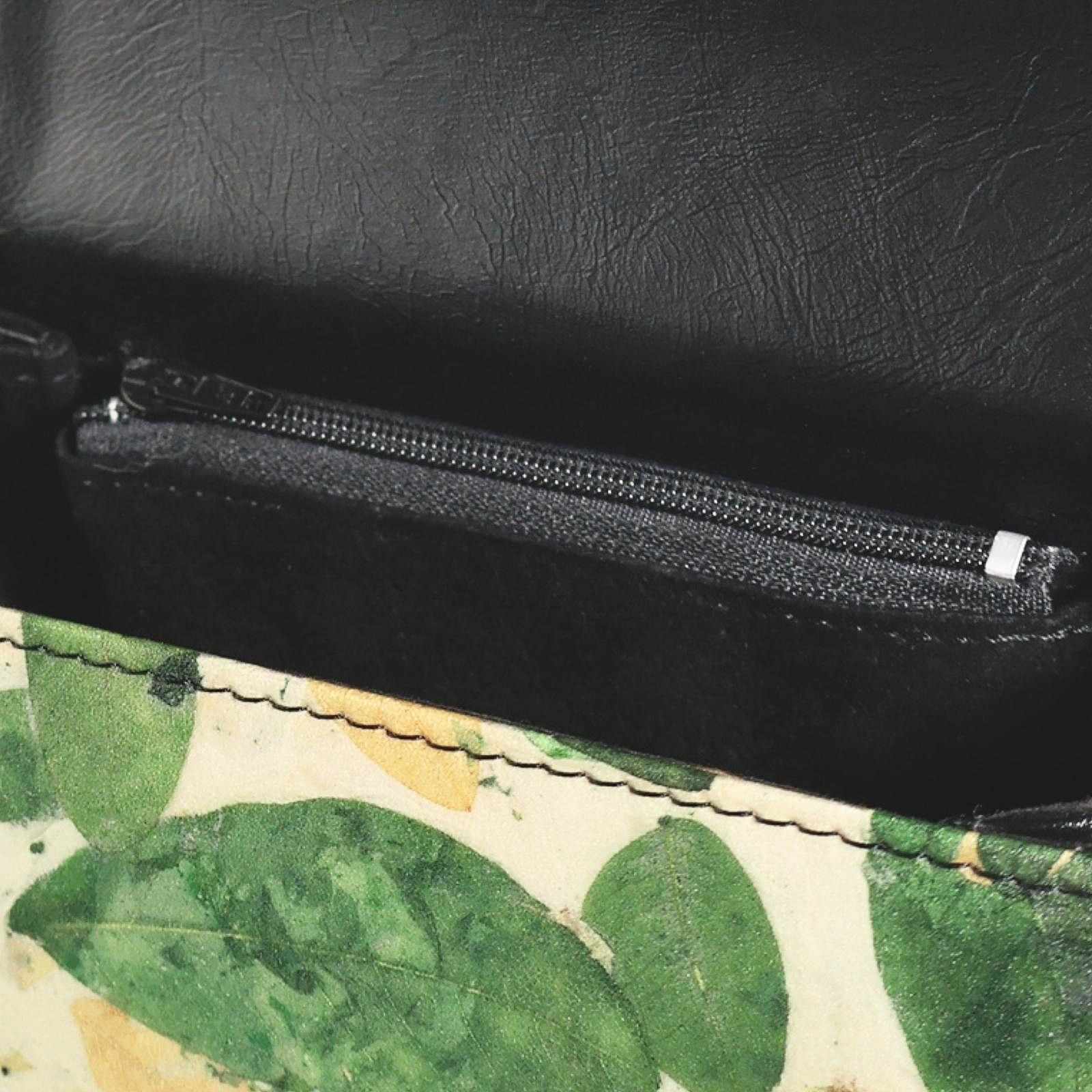 Interior of the Box Bag in Camouflage 2, showing the black lining and internal zip pocket.