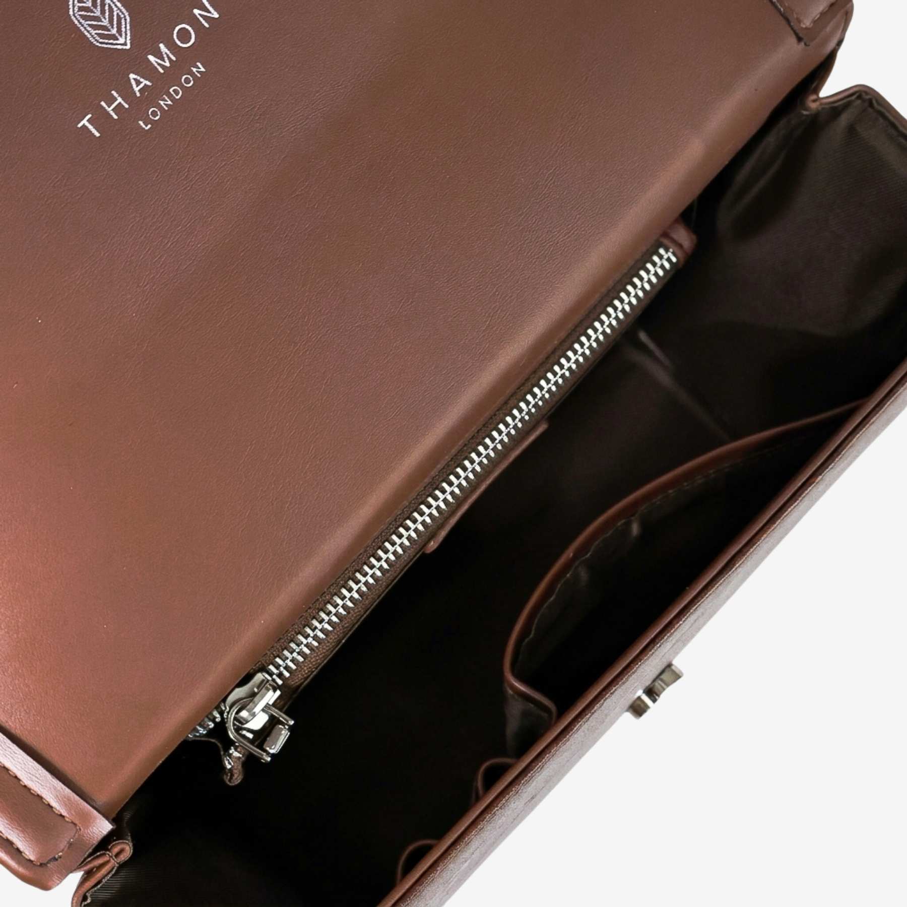 Interior detail of Camden bag in walnut brown made from leaf leather