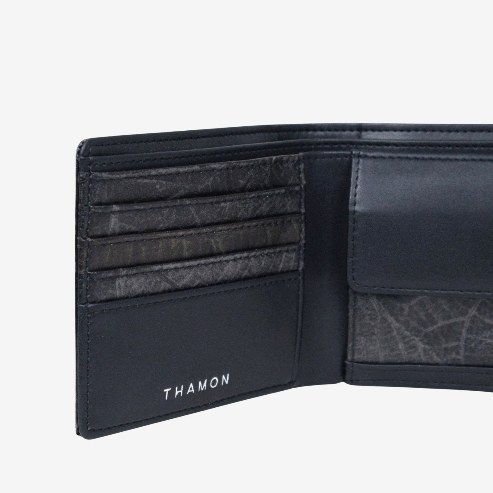 Detailed interior of coin wallet in black made from leaf leather