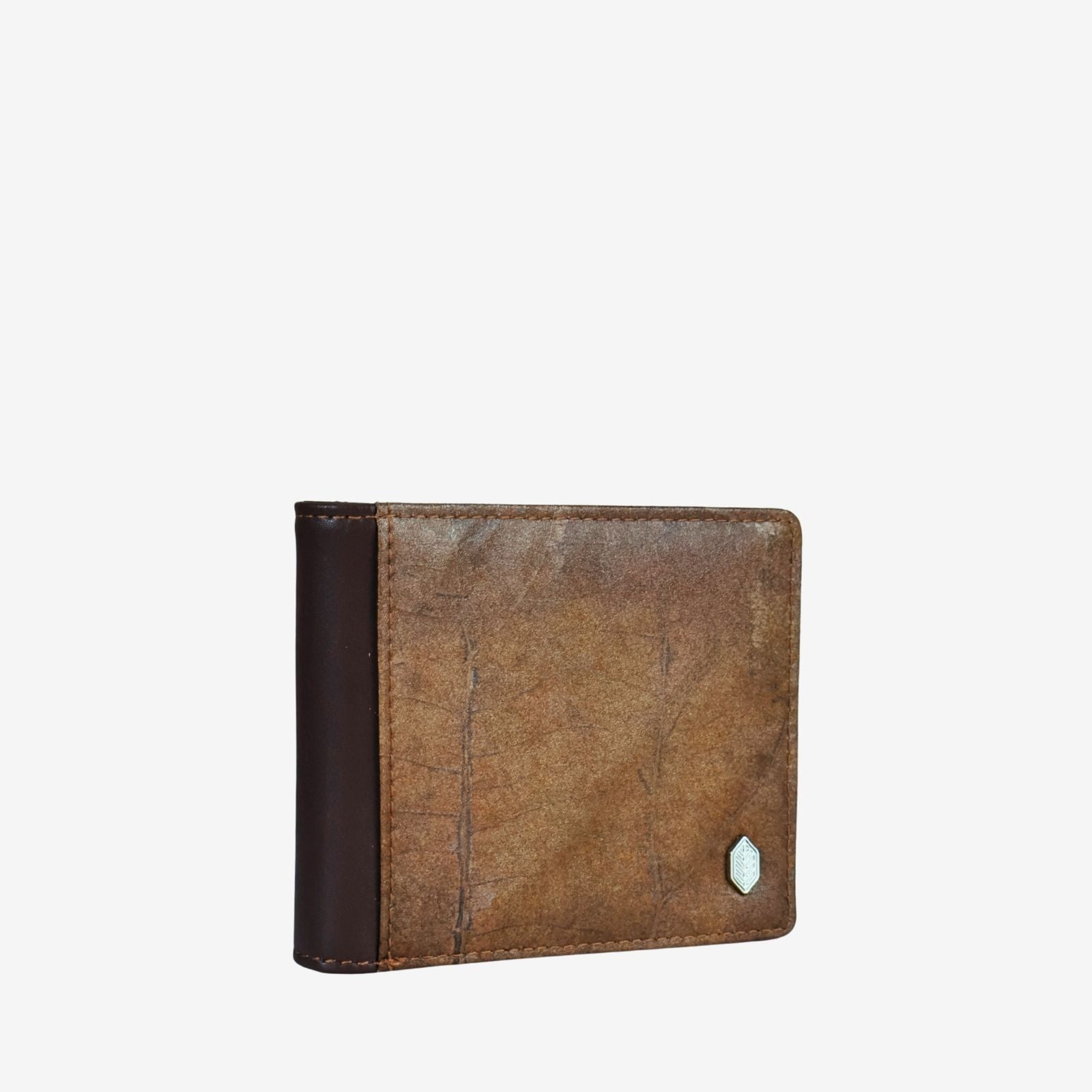 Side profile of coin wallet in spice brown made from leaf leather