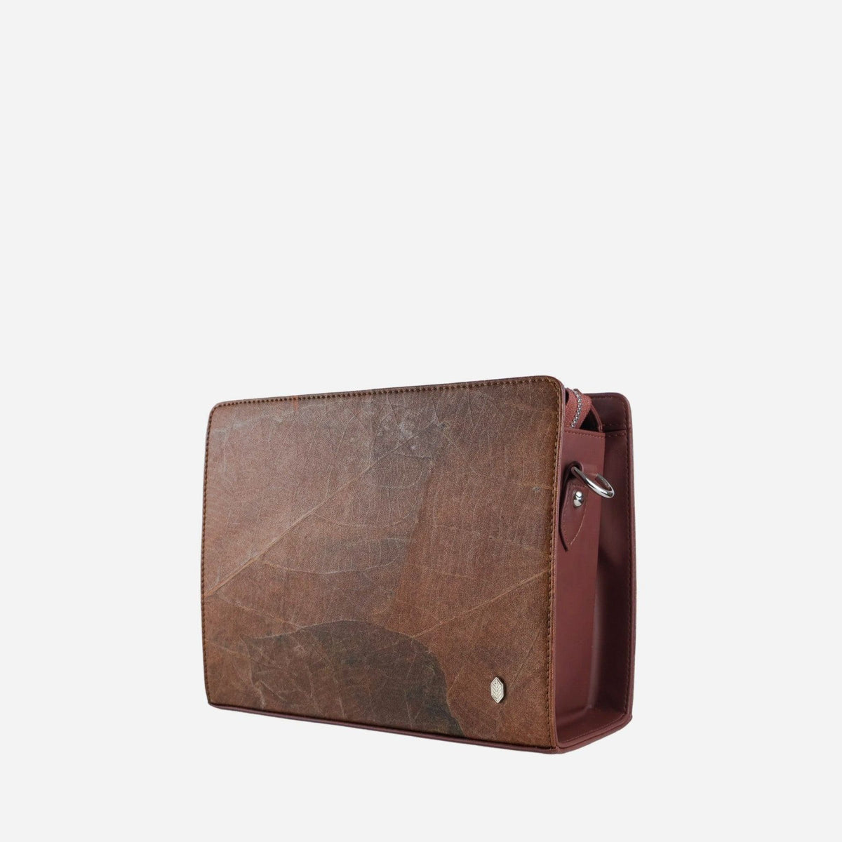 Ingrid bag in Walnut Brown with natural leaf texture, shown from the side