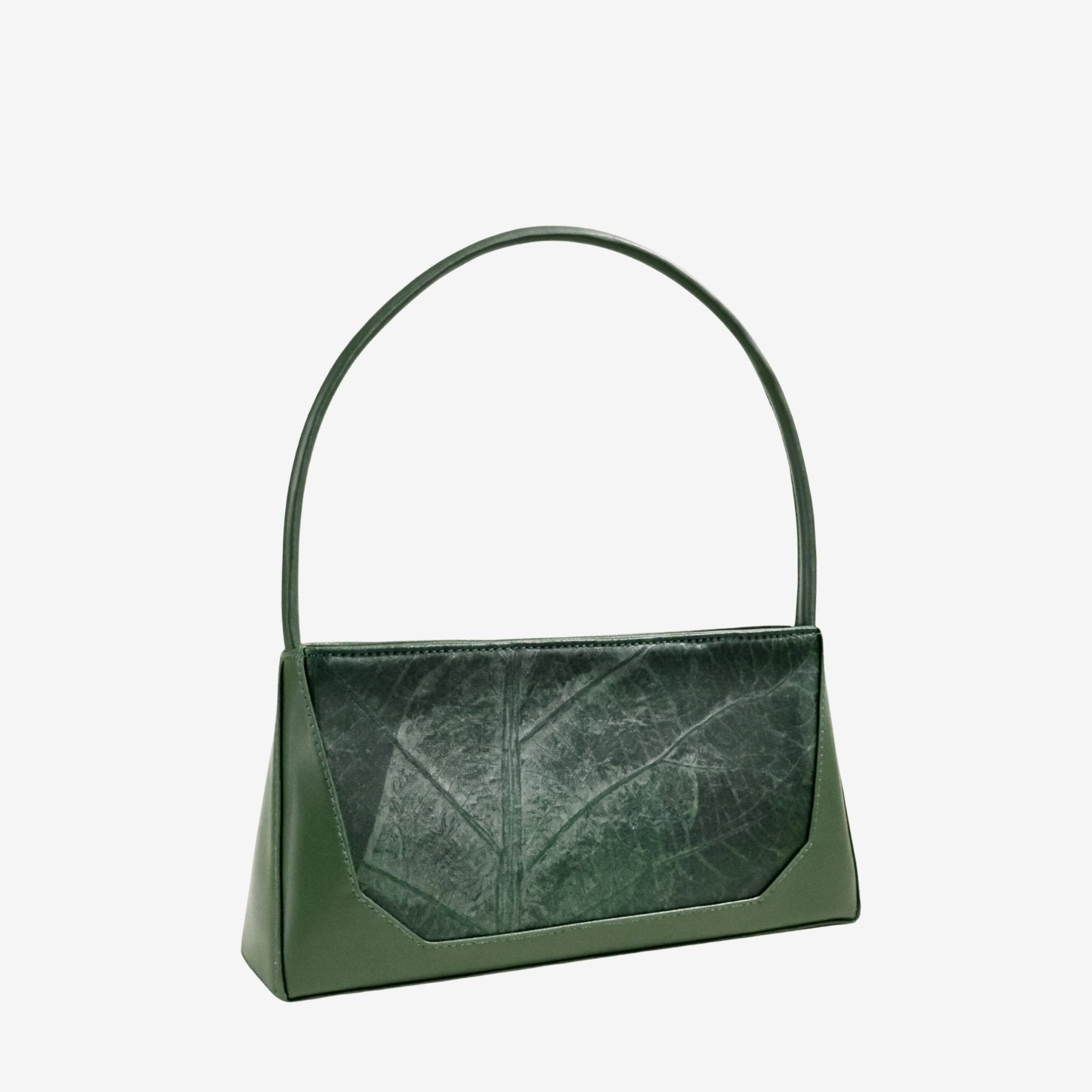 Three-quarter angle of IVES bag in forest green leaf leather showcasing its elegant structure
