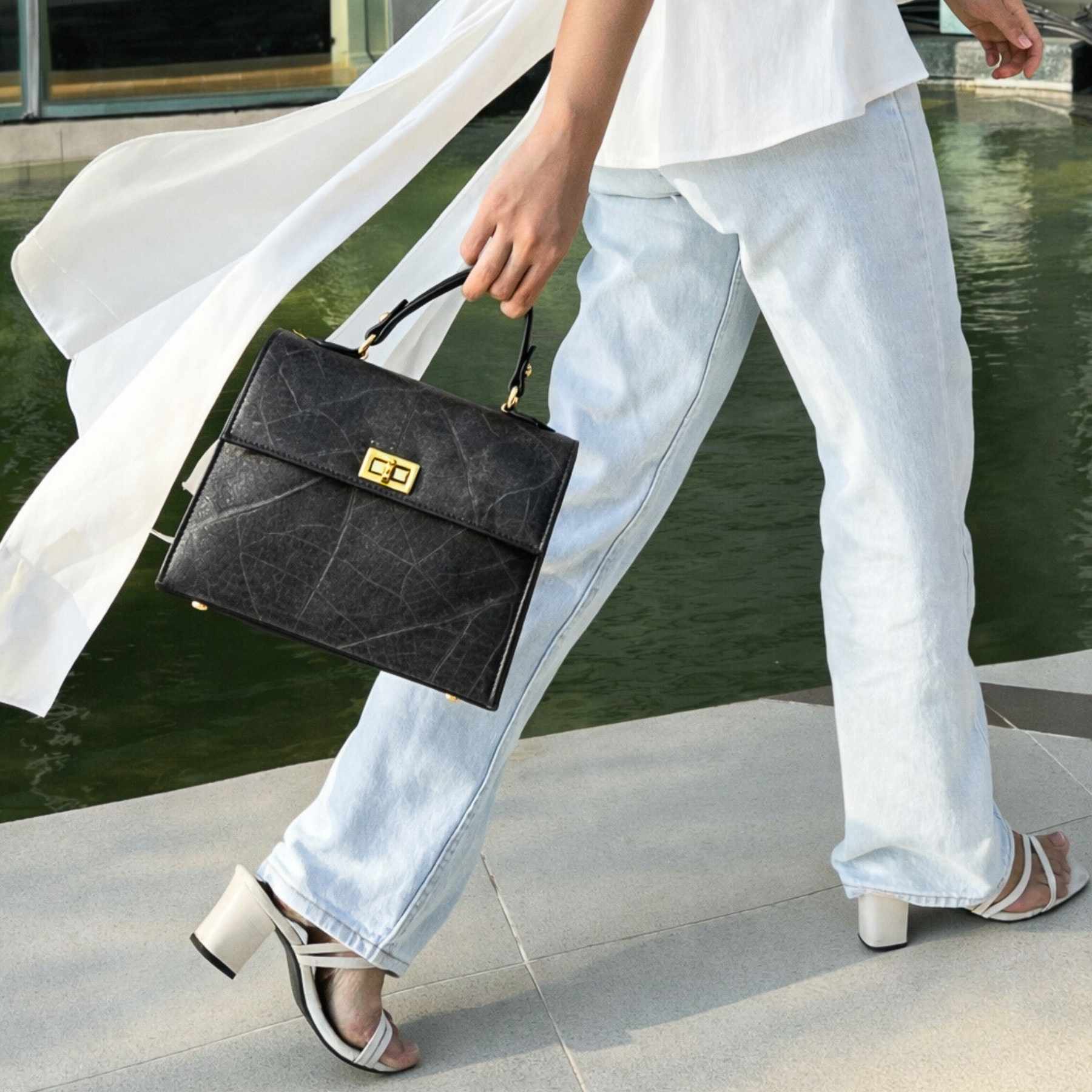 Lifestyle view of Kylie bag in black made from leaf leather