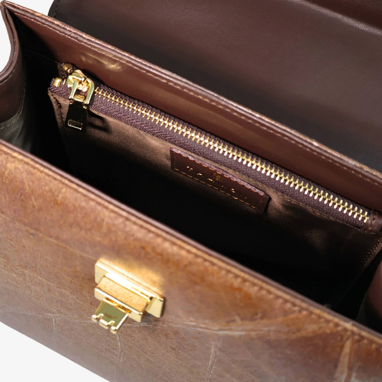 Close up detail of Kylie Edge bag in chocolate brown made from leaf leather