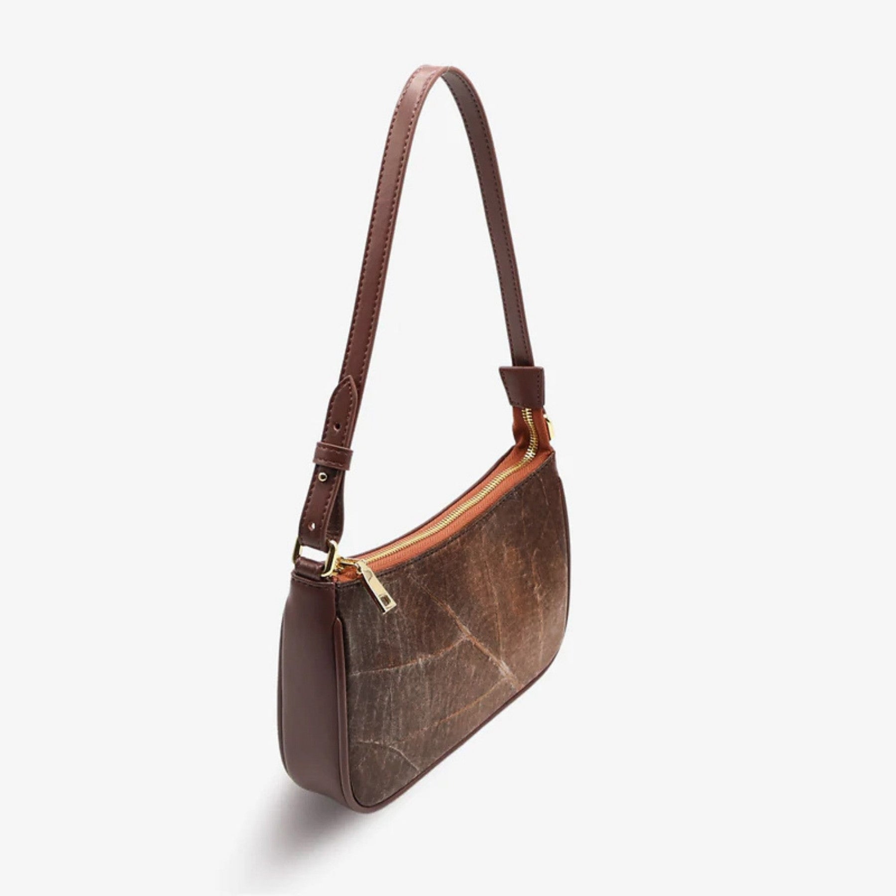 Angle view of Mila bag in walnut brown made from leaf leather