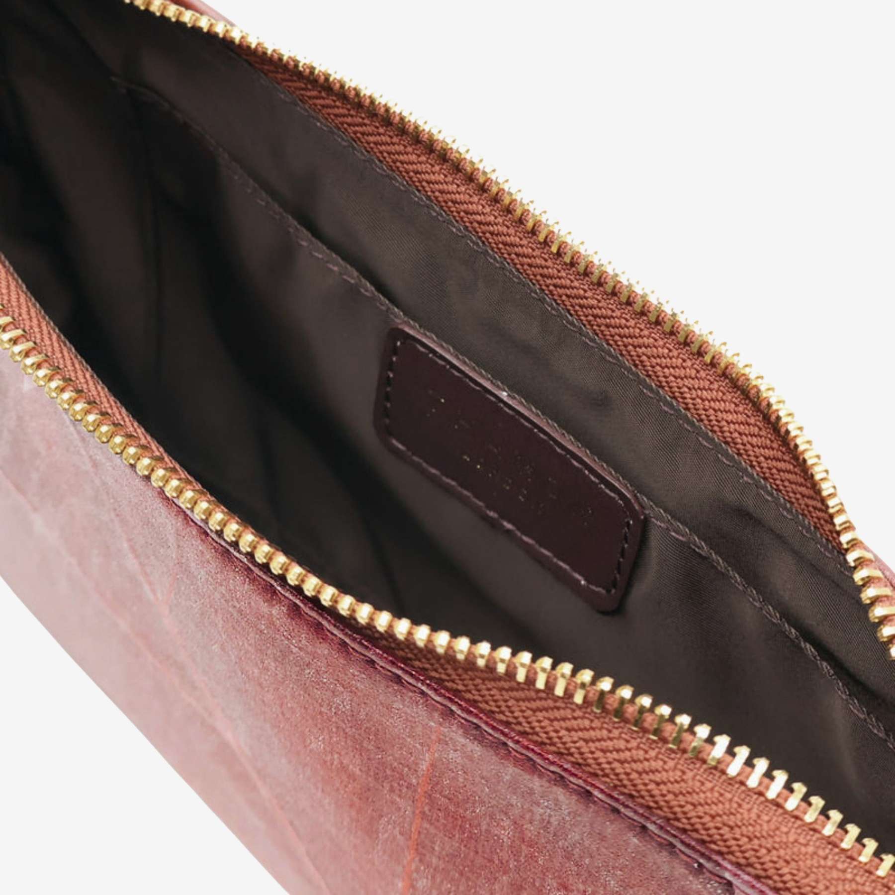 Interior view of Mila bag in spice brown made from leaf leather