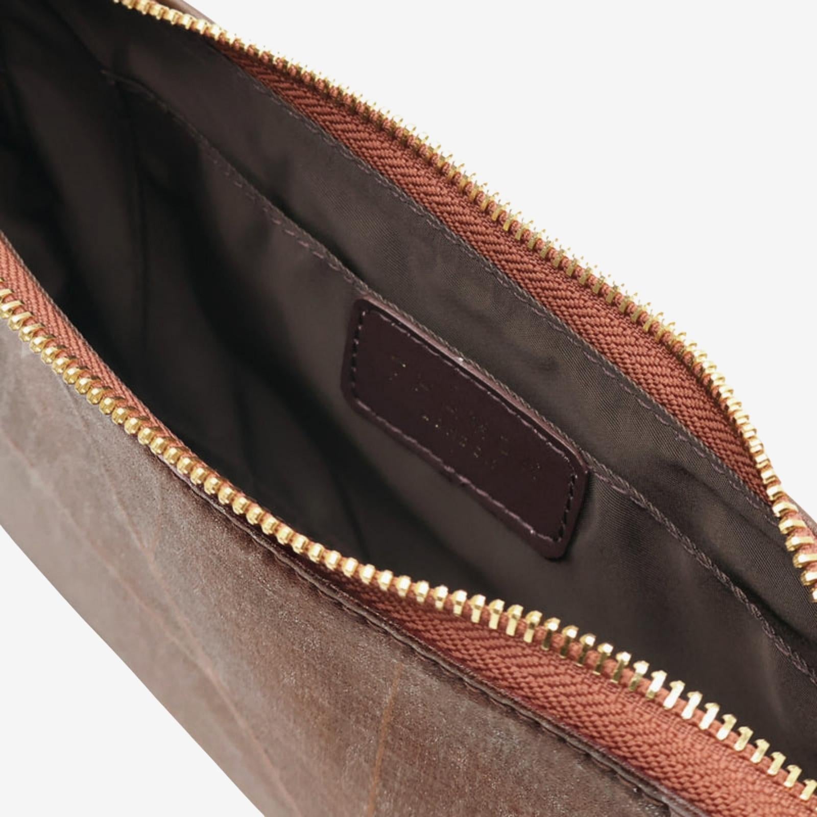 Interior view of Mila bag in walnut brown made from leaf leather