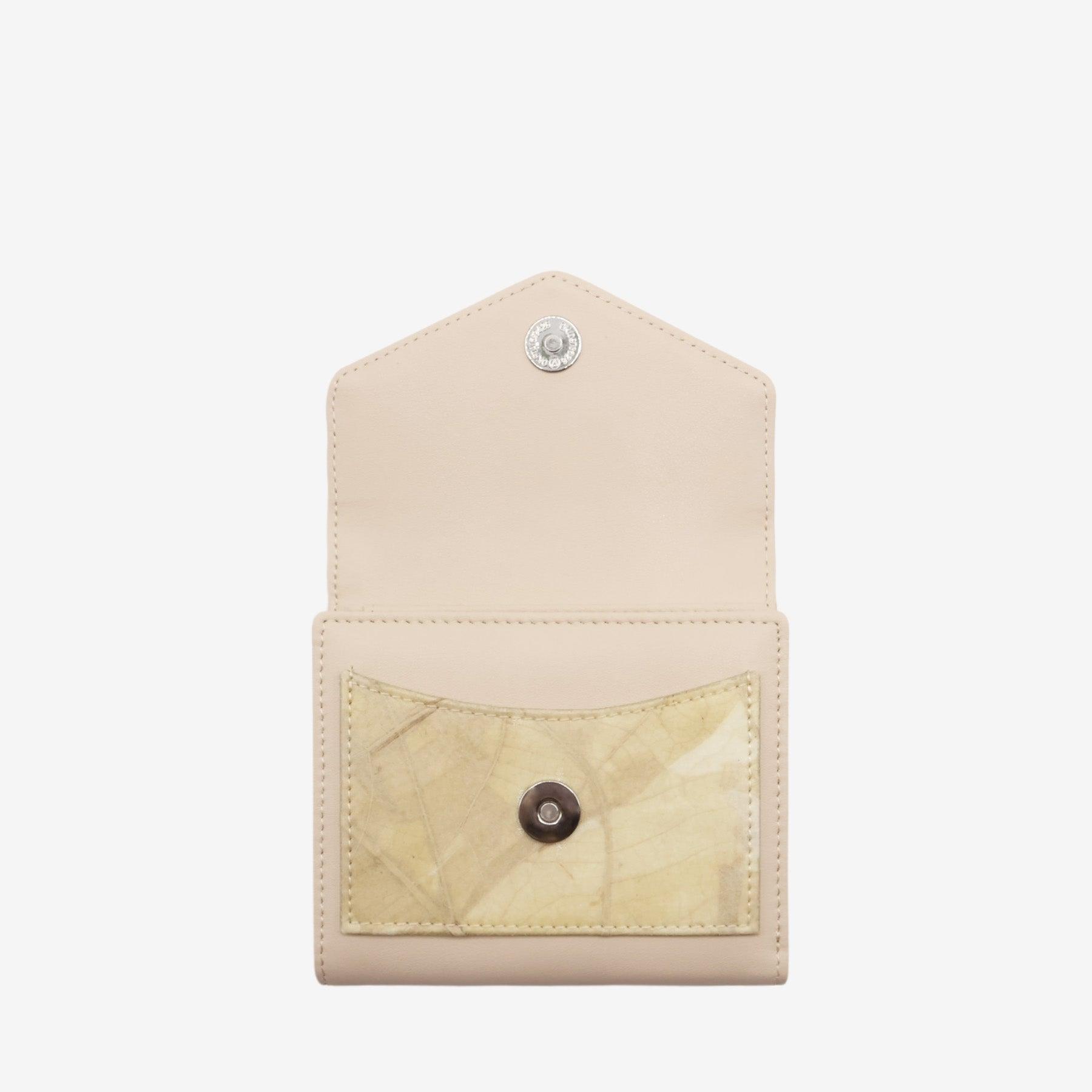 Open front view of the Milly Compact Wallet in cream by Thamon, displaying its leaf leather and micro fiber compartments.