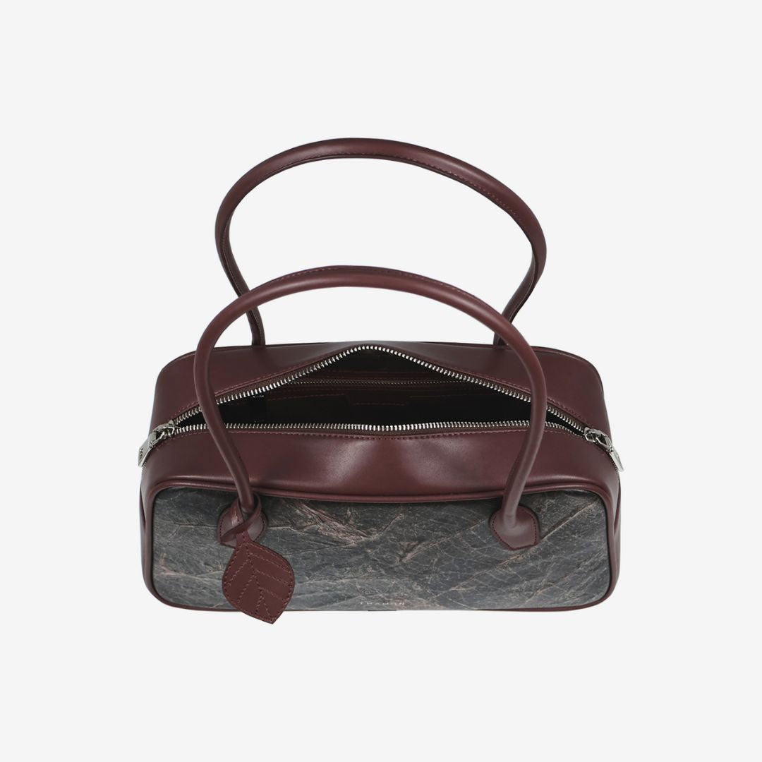 Top view of Thamon Boston Shoulder Bag in rustic brown with zipper closure and dual handles.