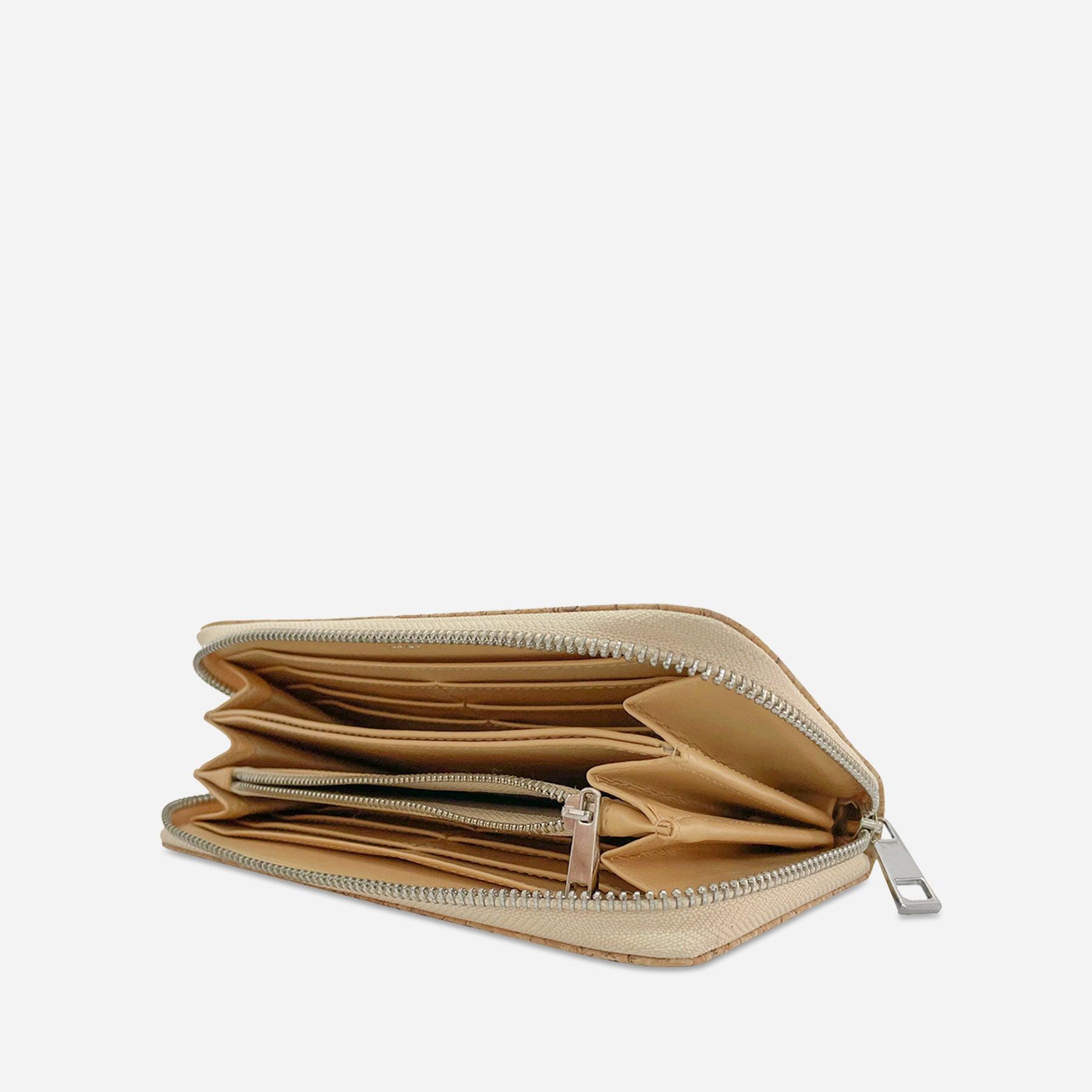 Interior view of cork zip-around wallet showing multiple compartments, card slots, and center coin pocket