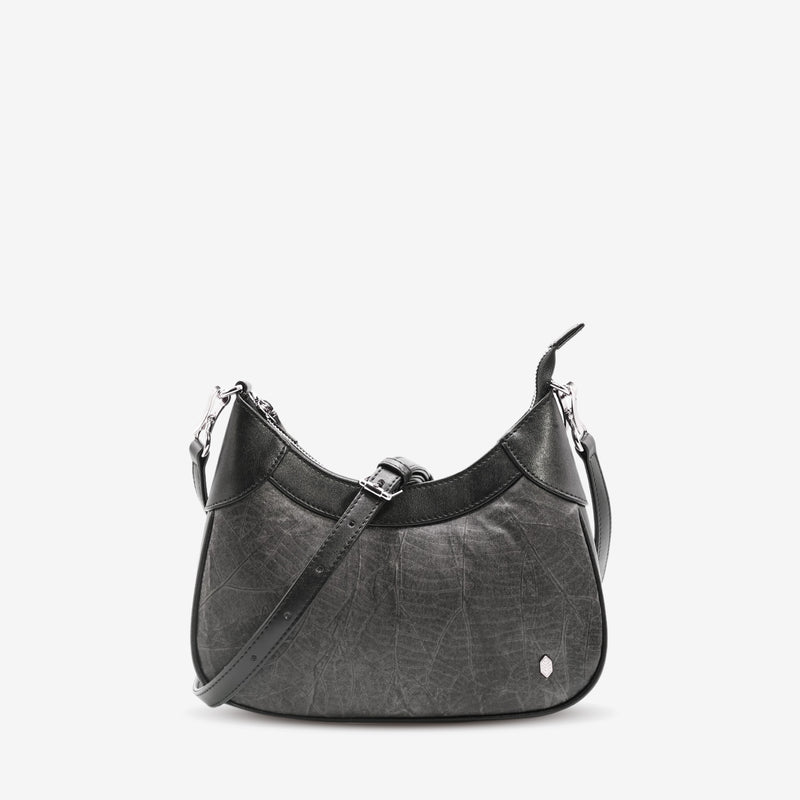 Detailed front view of the Kara Vegan Shoulder Bag in Black with crossbody bag strap highlighting the unique leaf pattern texture.