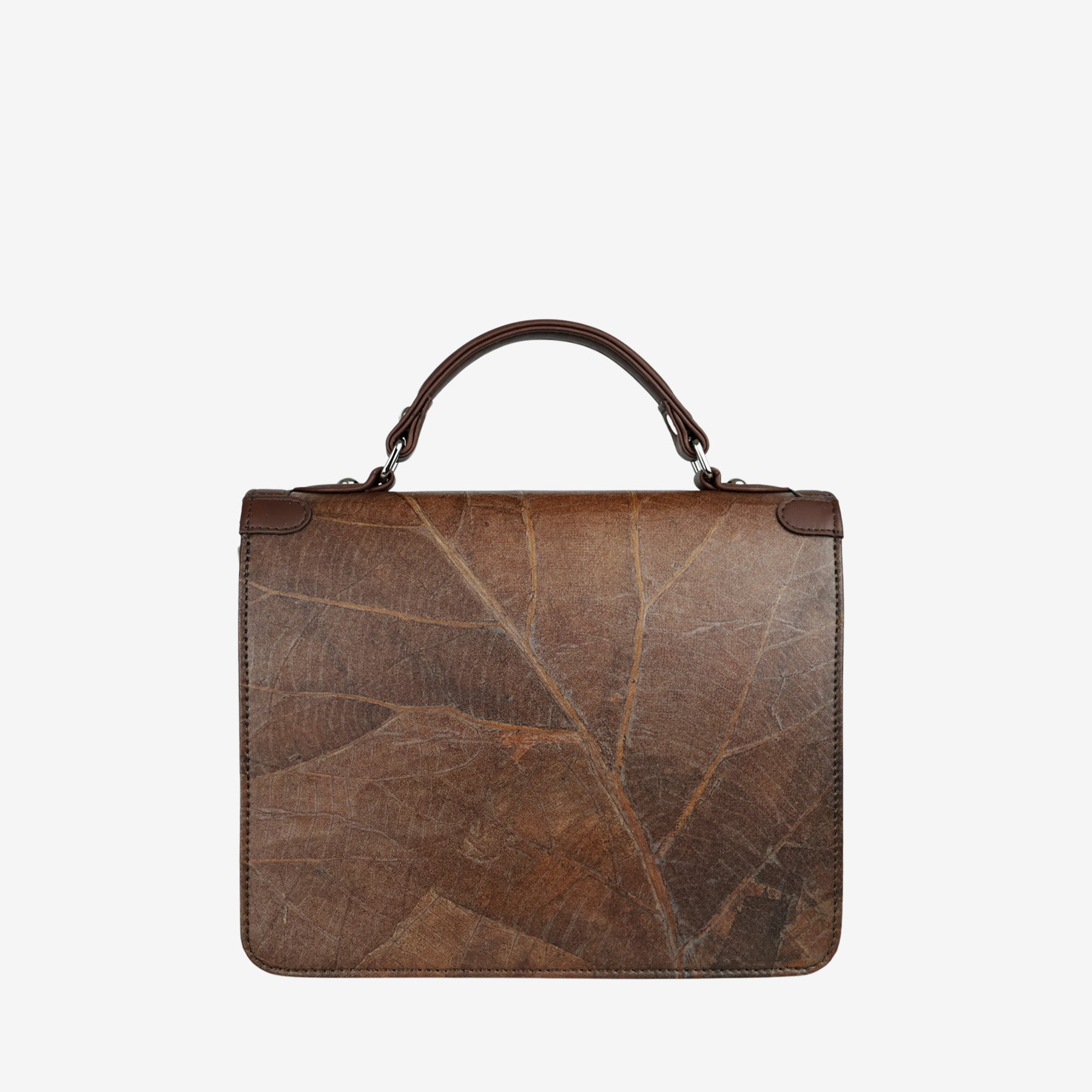 Back view of Camden crossbody bag in walnut brown Leaftex™, showcasing large natural leaf pattern and structured silhouette with top handle