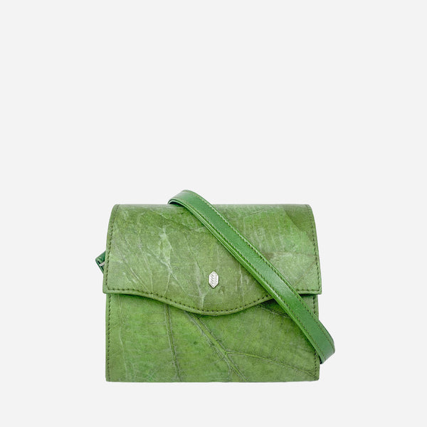 Thamon Forest Green Leaf Leather Box Bag with a natural leaf vein pattern throughout, featuring a front flap with magnetic closure and a matching green strap, set against a white background.