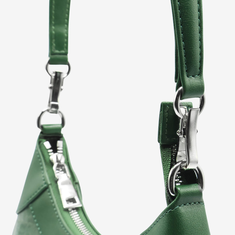 Close-up view of the detachable crossbody strap of Kara Vegan Shoulder Bag in Forest Green by Thamon, emphasizing the versatility and quality of the hardware.