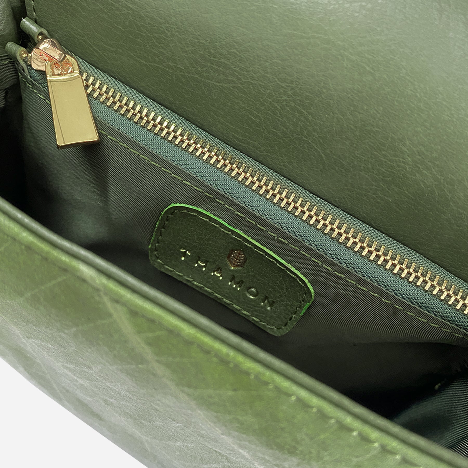 Inner Olive Pearl Crossbody Bag by Thamon