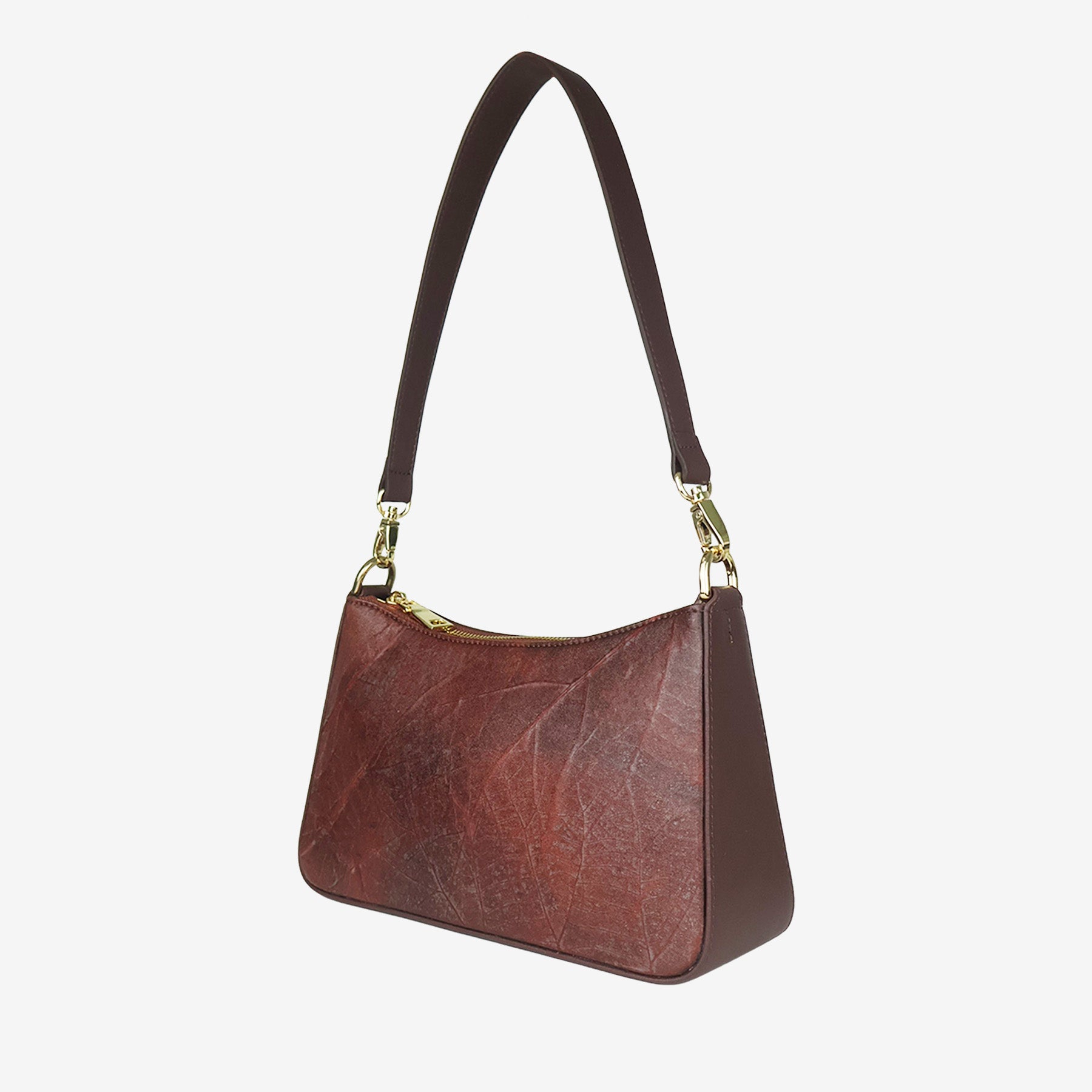 Spice brown Maki bag side view with adjustable straps and gold hardware.