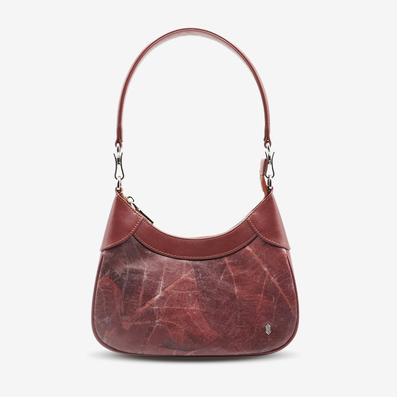 Front view of Kara Vegan Shoulder Bag in Chestnut Brown by Thamon showcasing its unique leaf pattern and sleek design.