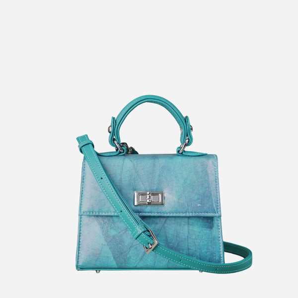 Front Turquoise Leaf Pattern Kylie Mini Bag by Thamon