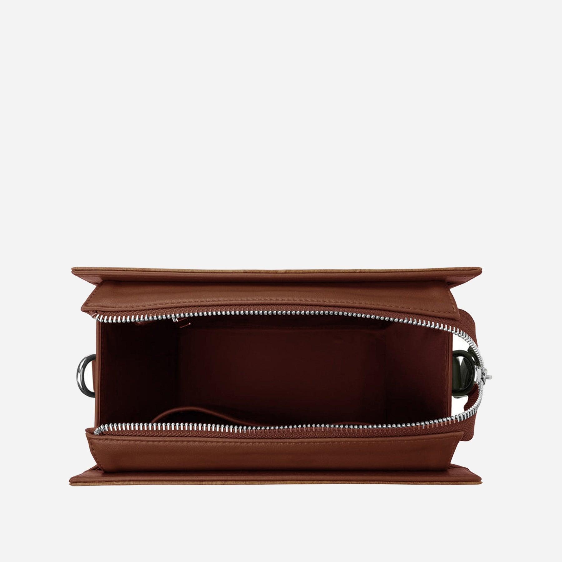 Top view of the Ingrid bag in walnut brown, showcasing its main compartment with zip closure, made from Leaftex (real leaf leather)