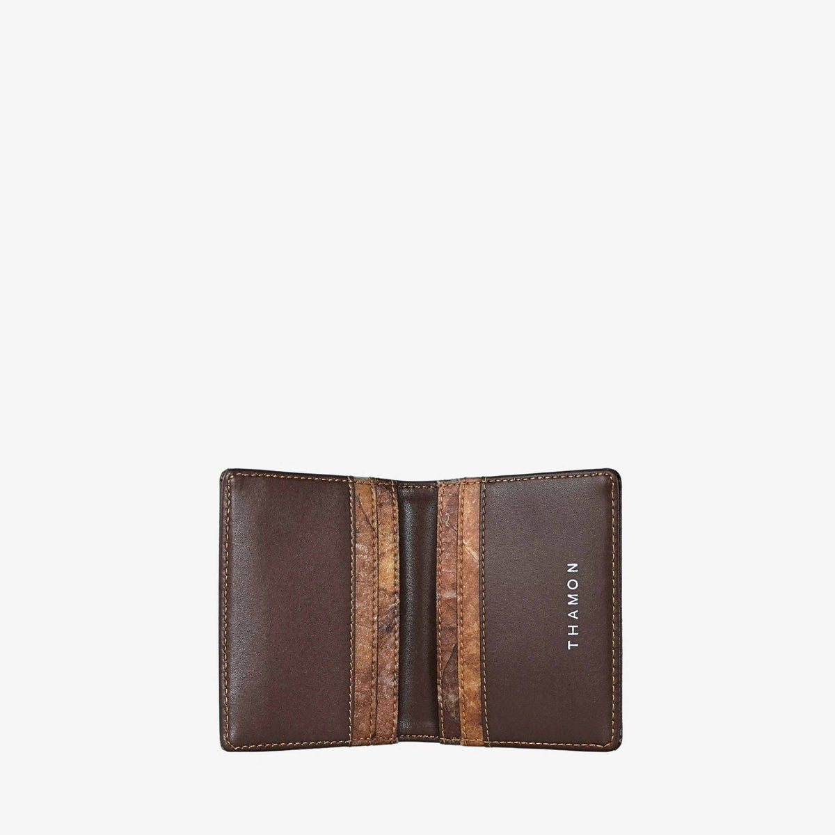 Bifold cardholder in Spice Brown shown open, with Leaftex card slots, multiple interior compartments and THAMON logo.