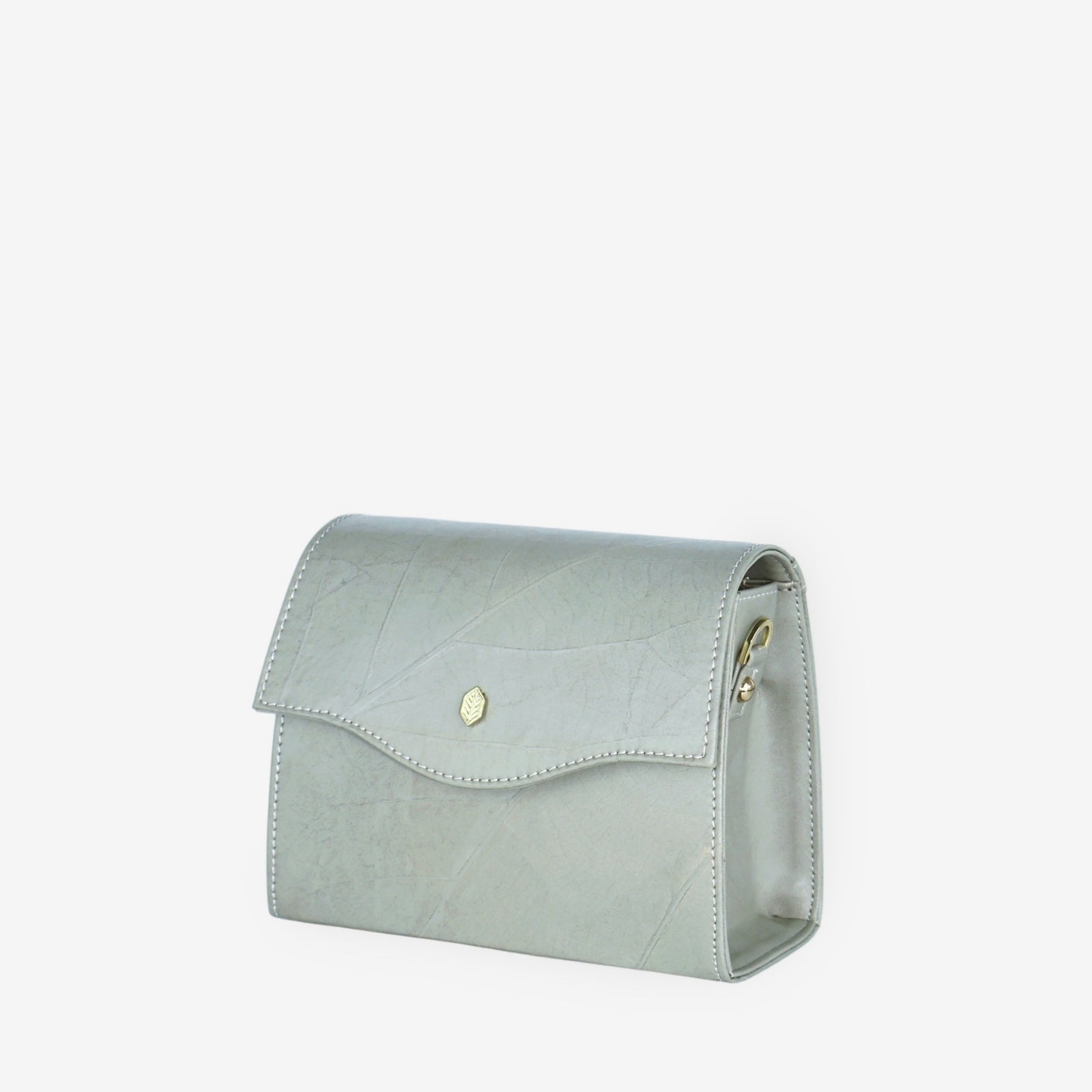 Side view of the Cloud Grey Box Bag in Leaftex, showing the structured profile and depth.