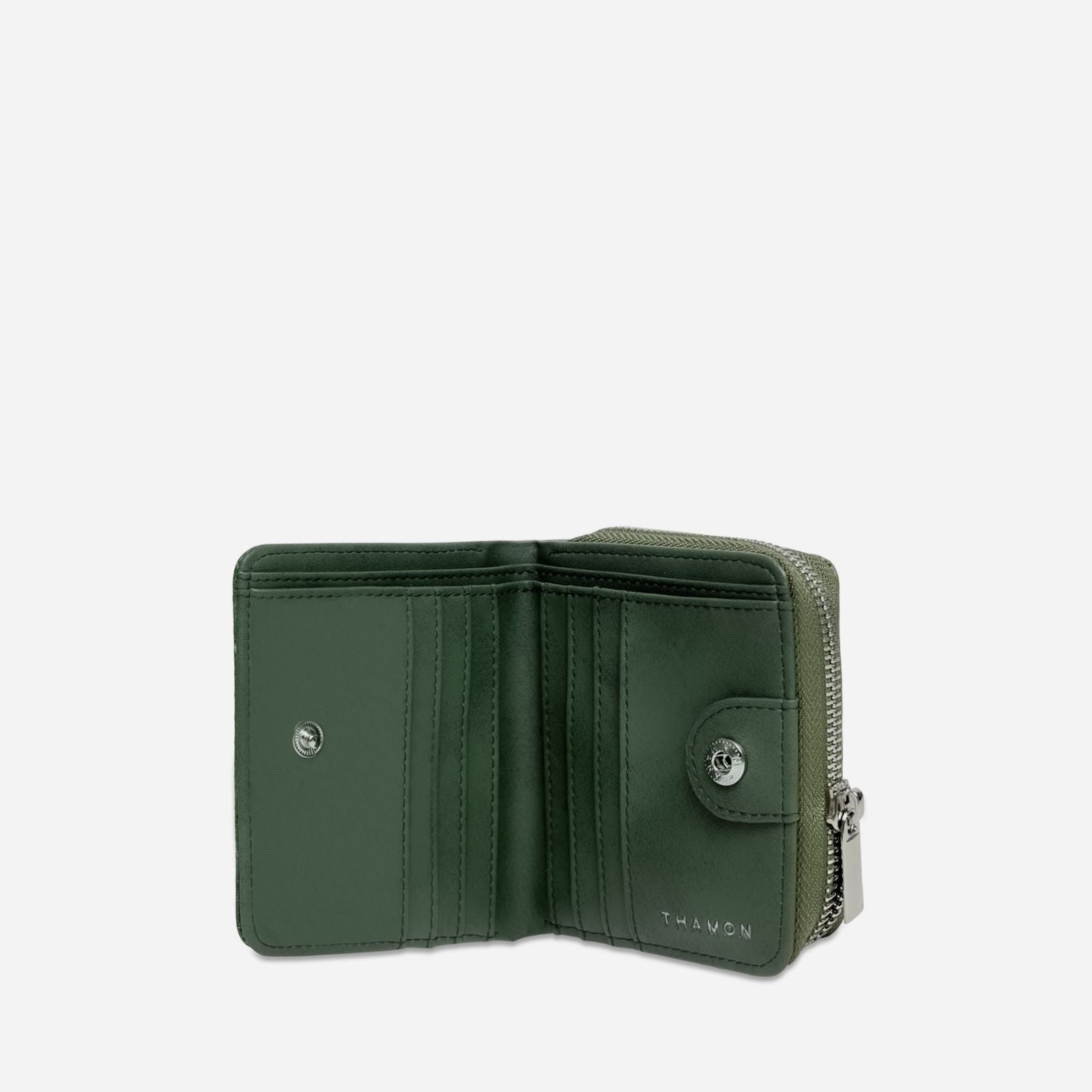 Interior view of the Compact Zip Wallet in Camouflage Leaftex showing the inner compartments