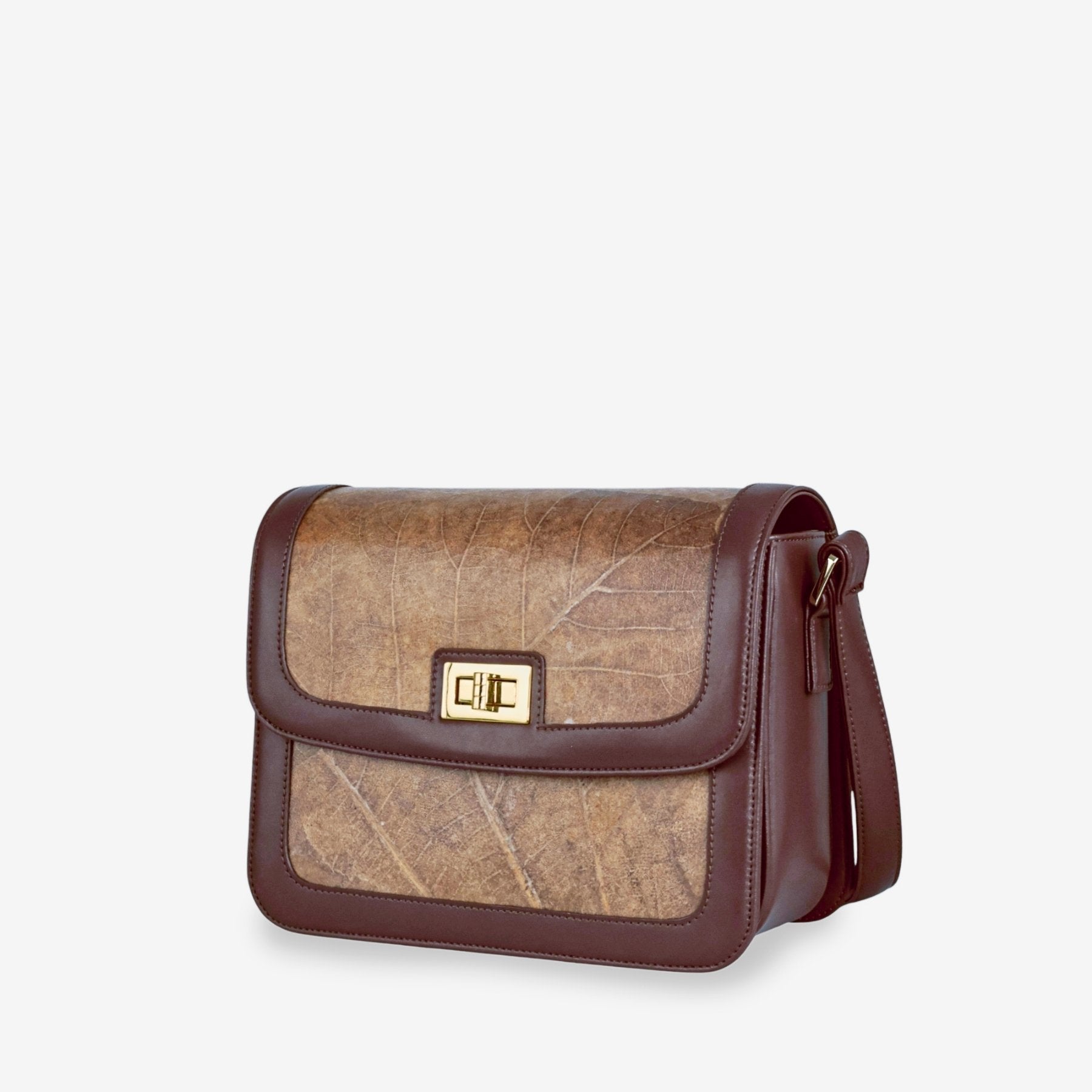 Side view of Copenhagen bag in chocolate brown made from leaf leather