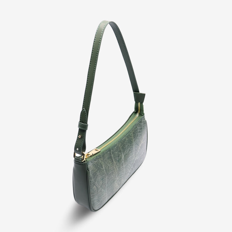 Side view of the Mila Forest Green Vegan Shoulder Bag showcasing the zipper closure and elegant leaf leather texture.