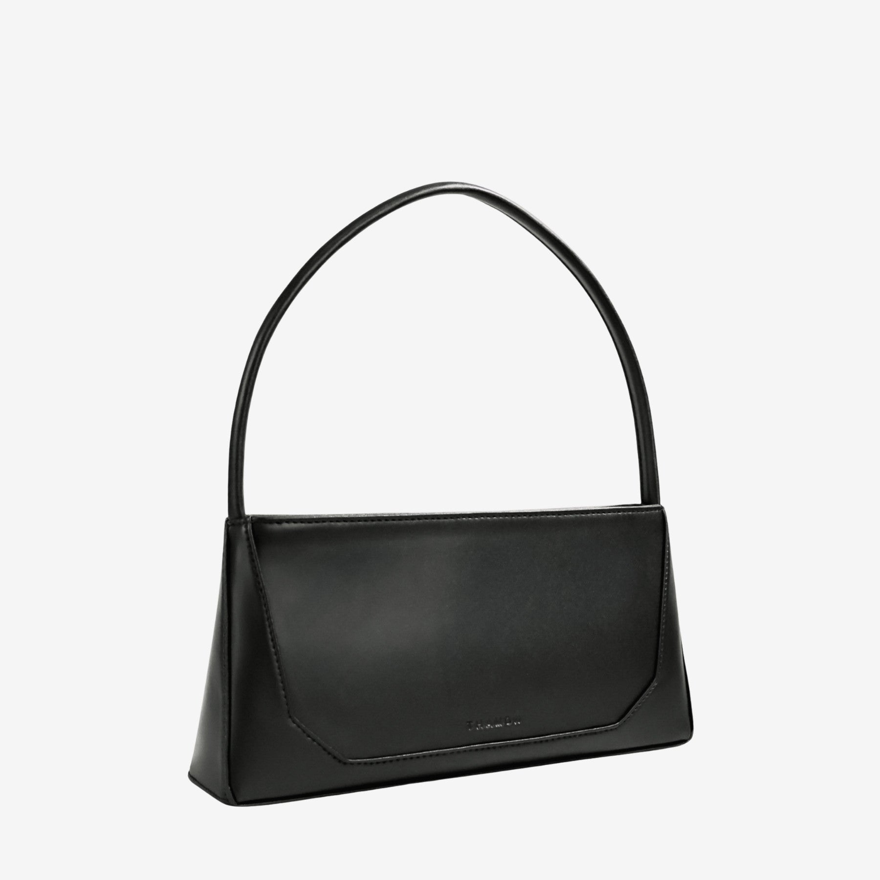 Three-quarter angle of IVES bag in black leaf leather accentuating its timeless appeal