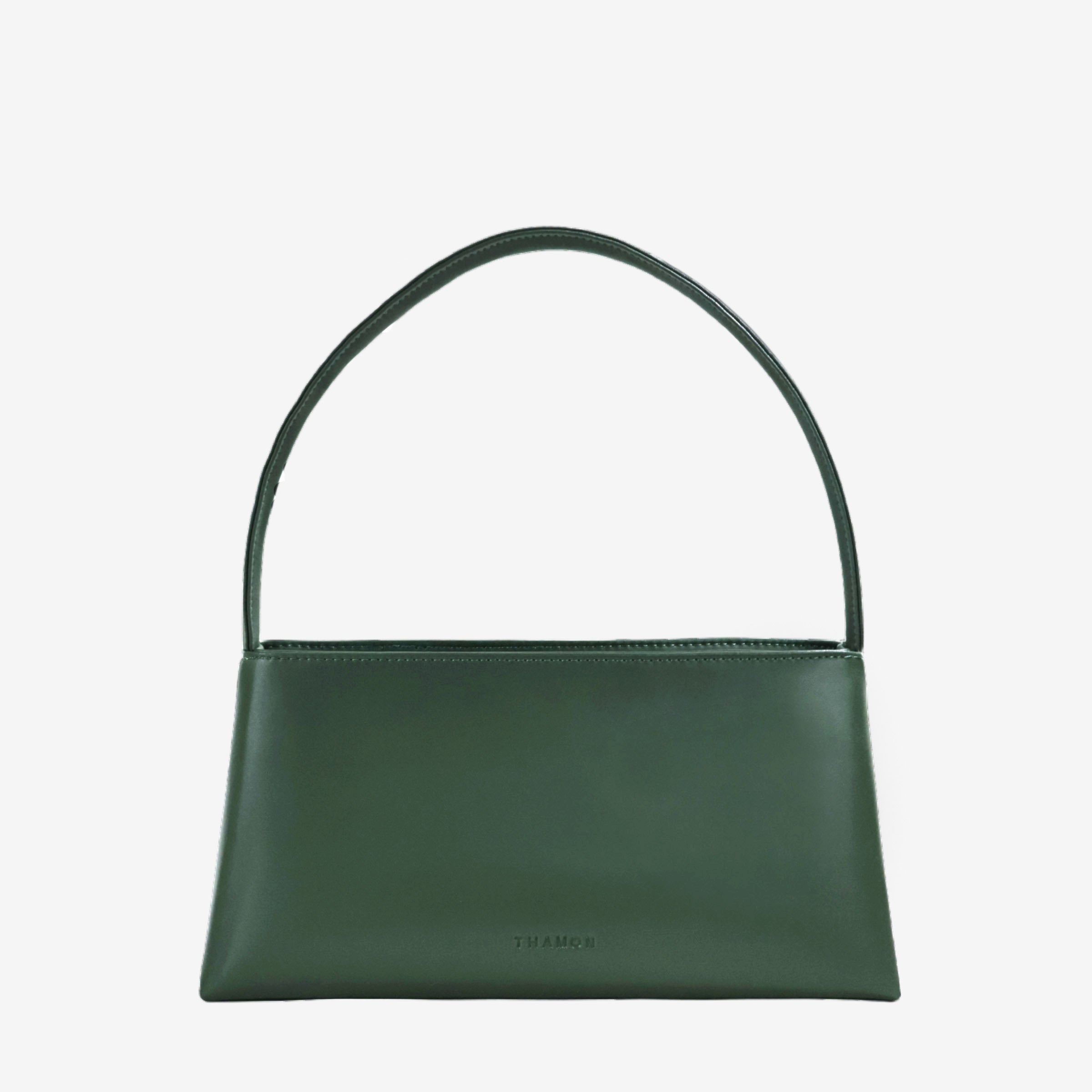 Back view of IVES bag in forest green leaf leather highlighting natural organic vein patterns