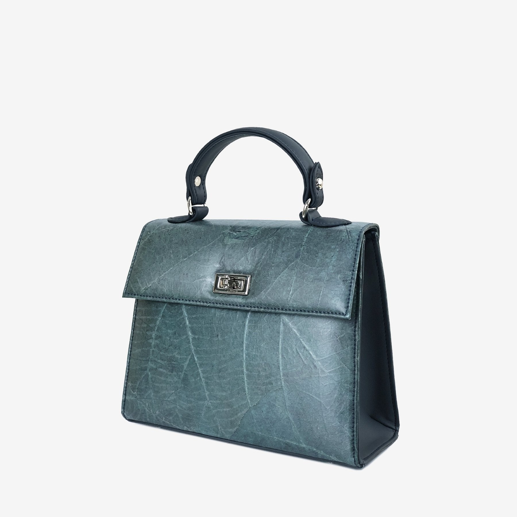 Kylie handbag in Blue Diane Leaftex with a top handle, silver-tone twist lock, and structured side profile.
