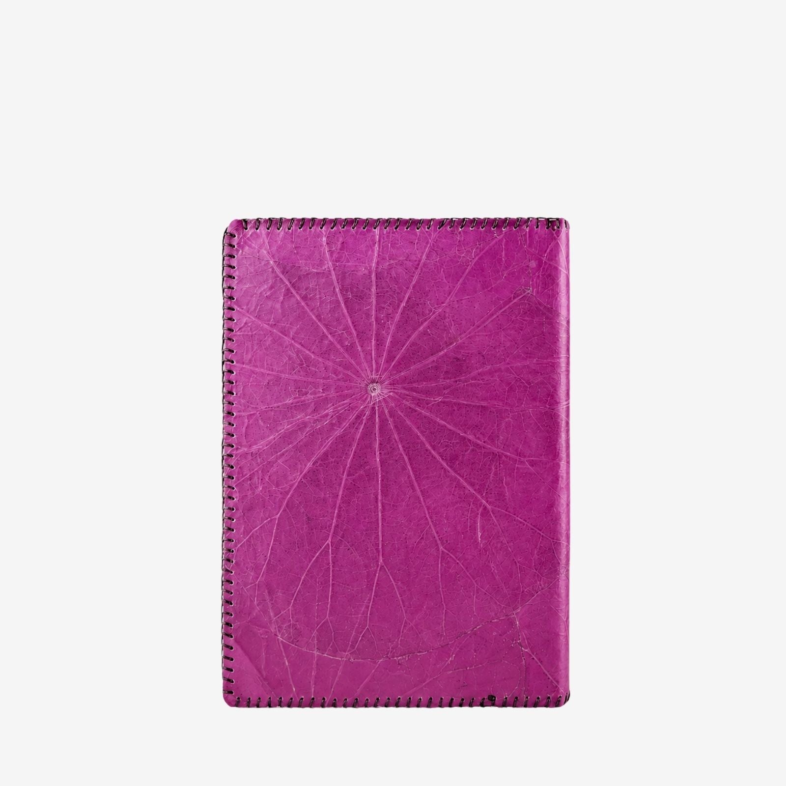 Back view of THAMON A5 refillable notebook in magenta purple, made from real lotus leaves with natural vein texture and dark stitched edges.