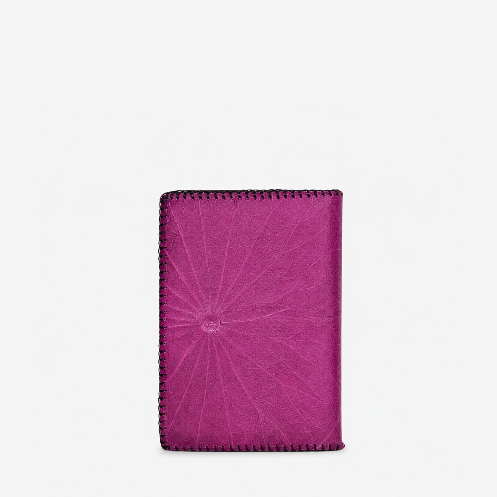 Back view of the Lotus Leaf A6 refillable notebook in magenta purple, made with Leaftex from real leaves.