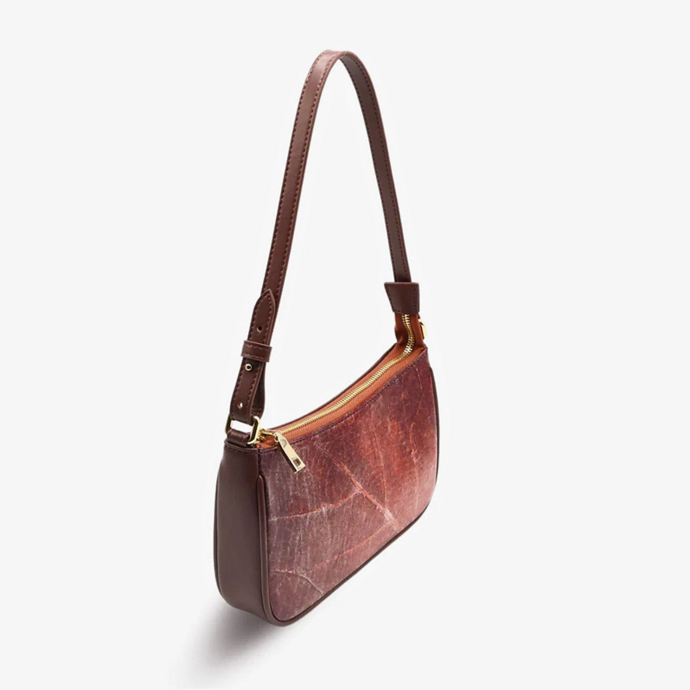 Angle view of Mila bag in spice brown made from leaf leather