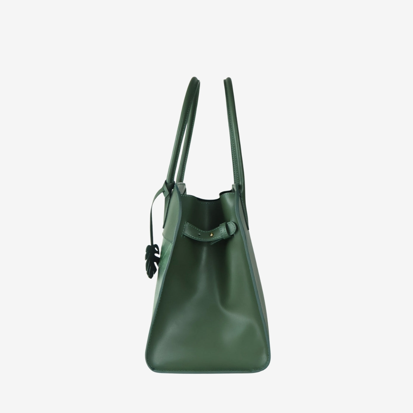 Side profile of Sloane tote bag in forest green made from leaf leather