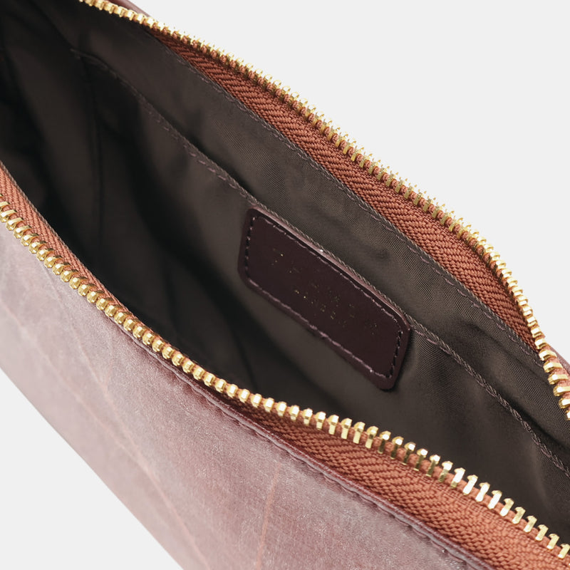 Inside view of the Mila Spice Brown Vegan Shoulder Bag showing the internal pocket with Thamon logo and zippered closure