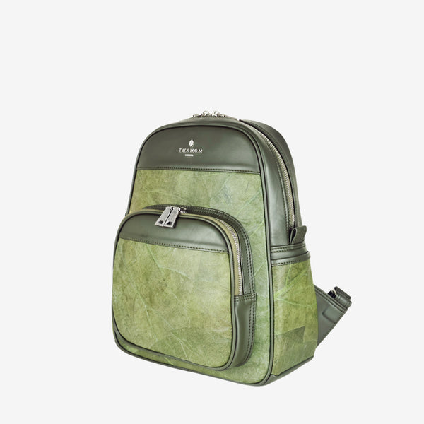 Side view of the Thamon Foglia backpack in olive green, made from sustainable leaf leather, featuring a front zip pocket with silver-tone hardware and a structured design.