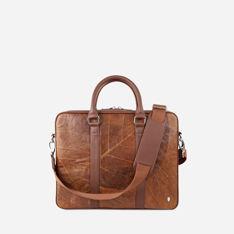 Front view of a Thamon spice brown leaf leather Cambridge briefcase with a distinctive leaf vein texture and an adjustable shoulder strap.