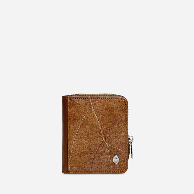 Front view of a Thamon spice brown leaf leather compact zip-around wallet with natural leaf vein texture and brand emblem.