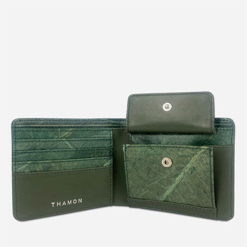 Interior view of the Forest Vegan Leather Men's Coin Wallet by Thamon, showcasing the open coin compartment and detailed leaf pattern.